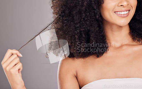 Image of Hair in hands, beauty and face of black woman with smile for wellness, natural growth and curly style. Salon aesthetic, luxury cosmetics and happy girl holding strand for healthy keratin treatment