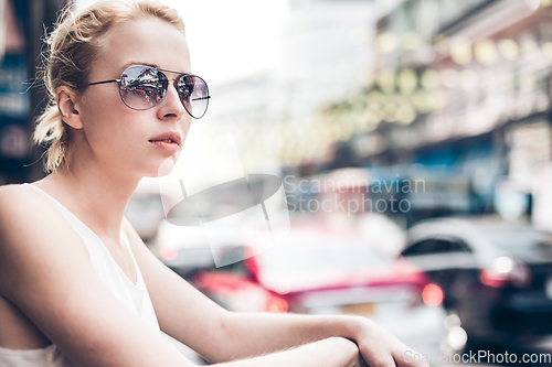 Image of Stylish Female Traveler in Bangkok.