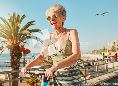 Image of Summer, scooter and happy senior woman enjoy beach day on weekend, retirement holiday and vacation. Travel lifestyle, journey and excited elderly female smile on adventure, freedom and relax in Miami