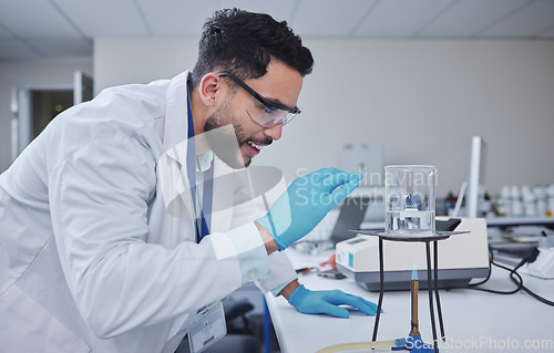 Image of Man, glasses or laboratory glass in science research, future dna engineering or bacteria analytics on fire flame. Happy, smile or scientist beaker in healthcare pharmacy test or medical study safety