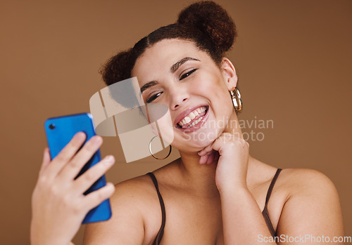 Image of Selfie, happiness and woman smile with a phone feeling excited, happy and beauty for profile picture. Social media, isolated and studio background with mockup of gen z, young and face of young person