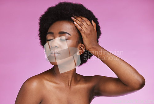 Image of Model, touching and afro hairstyle on beauty studio background in relax skincare, texture maintenance or salon wellness. Black woman, natural and hair growth hands on isolated pink or makeup backdrop