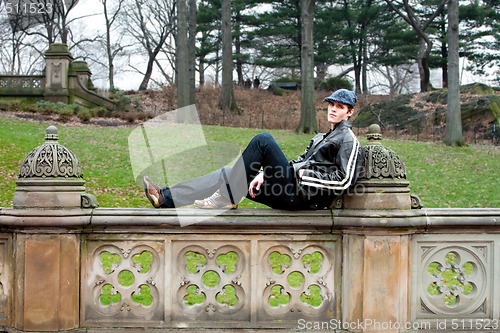 Image of Handsome man on railing