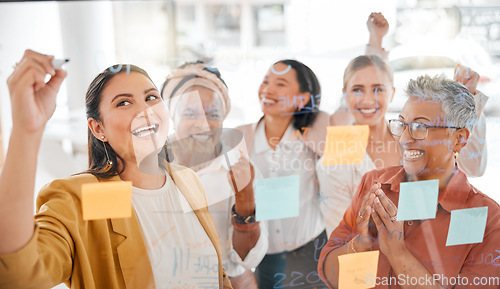 Image of Team planning, success or woman writing a winning marketing strategy or advertising plan for business ideas. Sticky notes, meeting or excited people working on global startup project target or goals