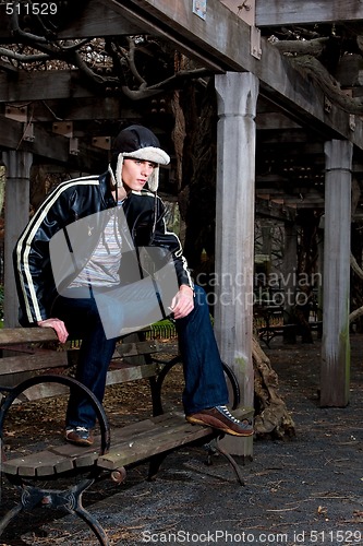 Image of Handsome man on bench