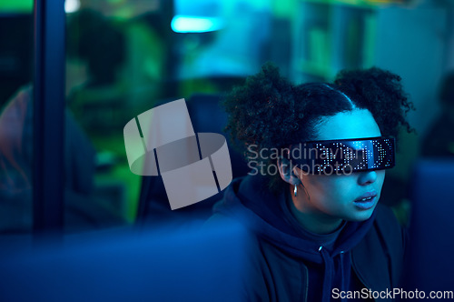 Image of Computer hacker, cyberpunk and neon woman hacking software, online server or programming password phishing. Blue ransomware developer, cyber security glasses and night programmer coding malware code