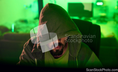 Image of Computer hacker, hoodie or neon man hacking database software, online server or password phishing. Green ransomware developer, cybersecurity programming or hidden night programmer coding malware code