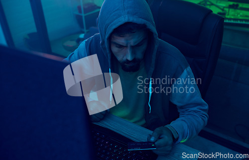 Image of Computer, credit card or neon hacker hacking online software, fintech server or fraud password phishing. Ransomware developer, man programming cybersecurity for scam or programmer coding malware code