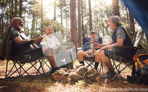 Image of Senior people, friends and camping with coffee in nature for travel, adventure or summer vacation on chairs in forest. Group of elderly men relax, talking or enjoying camp out by trees in the woods