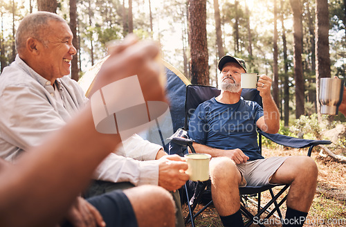 Image of Camping, trekking and senior men with coffee in nature enjoying drink, toasting in retirement celebration or travel. Elderly friends raising cup on camp chairs for friendship adventure in the forest