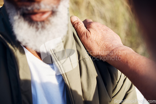 Image of Support, trust and hand on shoulder by senior man that comfort elderly person outdoors in nature for mental health. People, help and pensioner friends on retirement in unity due to cancer