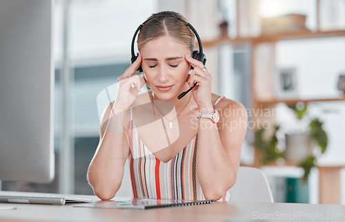 Image of Stress, headache and burnout woman in call center feeling pain, tired or exhausted. Customer service, mental health and female sales agent with depression, anxiety or migraine in office workplace.