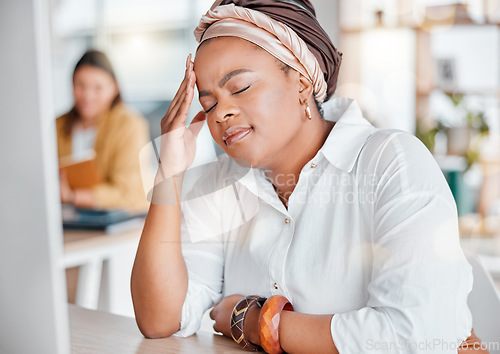 Image of Stress headache, burnout and black woman exhausted and overwhelmed with workload in office. Frustrated, overworked and tired employee with hand on head and anxiety from deadline time pressure crisis.