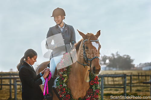 Image of Woman, horse and winner of equestrian competition with ribbon award for sports achievement. Athlete person on animal for horseback riding, race and training for badge prize with pride in countryside