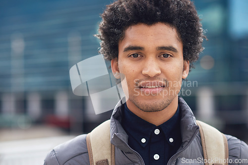 Image of Black man, city portrait and with backpack for travel, studying and focus by blurred background. Young gen z student, outdoor adventure and happy in metro with goals, vision and dream by buildings