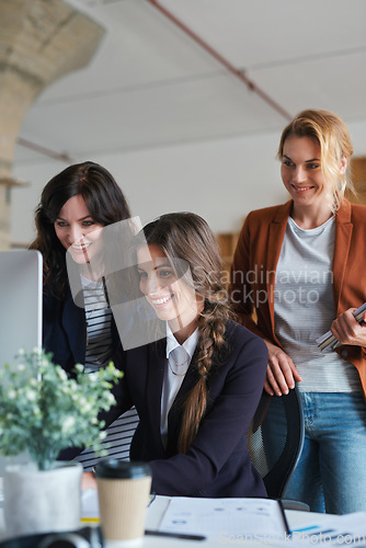 Image of Teamwork, office and business people planning a project together on technology or computer. Collaboration, professional and team of corporate women working on a company report in the workplace.