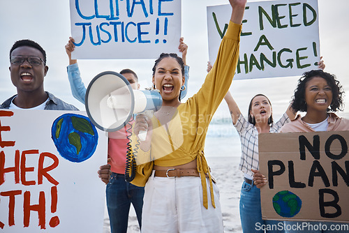 Image of Climate change, protest and black woman with megaphone for freedom movement. Angry, crowd screaming and young people by the sea with world support for global, social and equality action at the beach