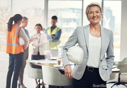 Image of Portrait, construction worker and manager with an engineer woman at work in her architecture office. Industry, design and building with a female architect leader working on a development project