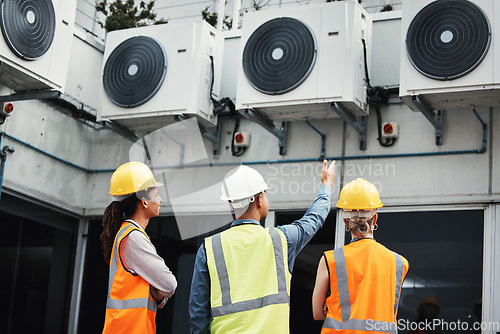 Image of Building, looking and employees doing maintenance inspection on warehouse air together. Safety, engineering and handyman with contractor women or analysis of construction repairs at a factory