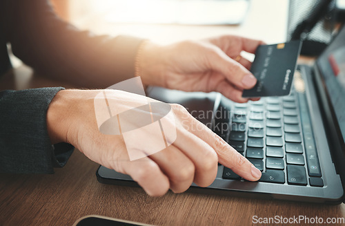 Image of Online shopping, credit card and hands typing on a laptop for ecommerce, payment and banking. Business, finance and employee on the internet for retail, purchase and ordering from the web on a pc