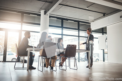 Image of Businesswoman, coaching and meeting in conference for idea or leadership at office workshop. Female leader, coach or mentor speaking in staff training for marketing, planning or corporate strategy