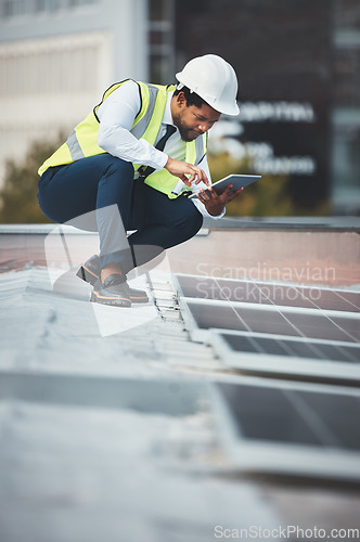 Image of Solar panels, engineering and black man with tablet for construction, maintenance and inspection. Sustainability, renewable energy and electrician with digital tech for clean photovoltaic electricity