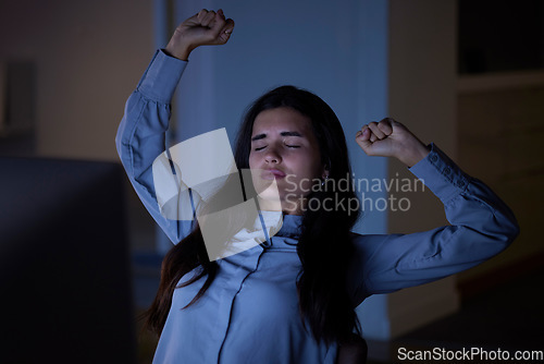 Image of Tired, night and woman stretching in the office while working late on a project with a deadline. Burnout, fatigue and exhausted professional female business employee ready to sleep in the workplace.