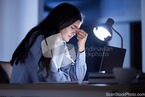 Image of Business woman at desk, headache and burnout, stress and corporate fatigue, laptop and glitch. Working night, overtime and deadline problem, 404 and tired with overworked employee and frustration