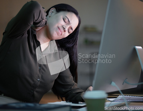 Image of Woman with neck pain, working at night in office with computer and mental health of corporate business worker. Young overworked person at desk, backache from late workload and employee burnout