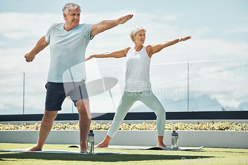 Image of Senior couple, yoga and warrior pose in meditation by countryside for healthy spiritual wellness in nature. Elderly woman and man yogi meditating for calm peaceful exercise together in the outdoors