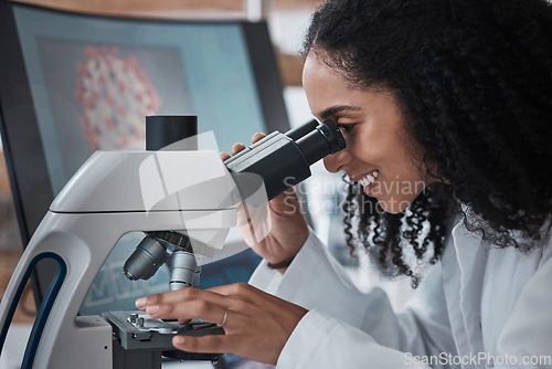 Image of Science, microscope and zoom with a doctor black woman at work in a lab for innovation or research. Medical, analysis and slide with a female scientist working in a laboratory on breakthrough