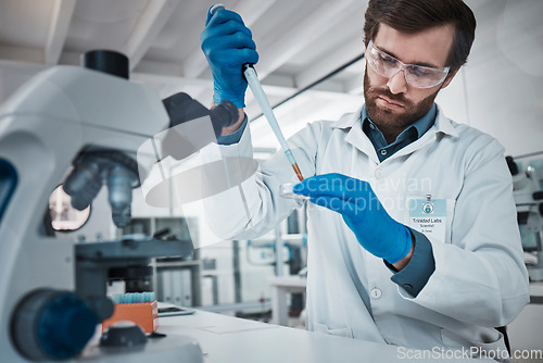 Image of Man working in laboratory, study chemical dna in test tube and research scientific technology in Germany. Expert pathology scientist, liquid solution and focus on career in futuristic science