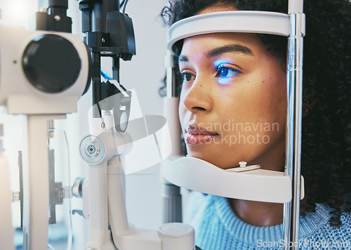 Image of Ophthalmology, medical and eye exam with black woman and consulting for vision, healthcare and glaucoma check. Laser, light and innovation with face of patient and machine for scanning and optometry