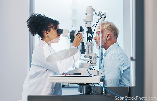 Image of Vision, eye test and insurance with a doctor woman or optometrist testing the eyes of a man patient in a clinic. Hospital, medical or consulting with a female eyesight specialist and senior male