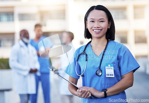Image of Checklist, portrait and happy doctor or woman with hospital leadership, workflow management and surgeon schedule. Face of healthcare worker, nurse or asian person for medical services and paperwork