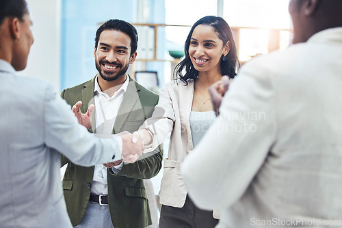 Image of Handshake, business people and applause from consulting success with office management group. Happiness, hiring and teamwork of leadership shaking hands for contract and thank you hand gesture