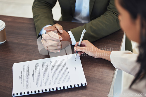 Image of Interview, office and woman signing a document after a corporate job recruitment with human resources. Paperwork, signature and professional female writing on a business company document in workplace