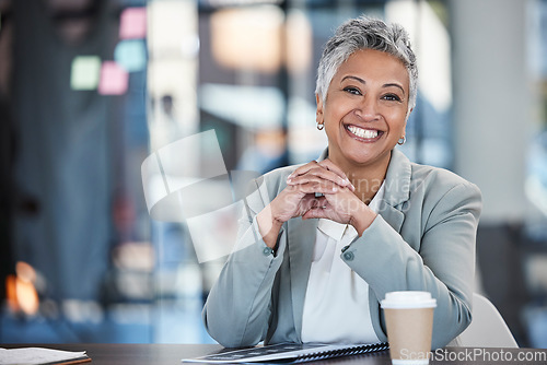 Image of Smile, executive and portrait of a woman in business for working, success and goals. Corporate, happy and mature office employee sitting at a desk to start work in the morning at a legal company