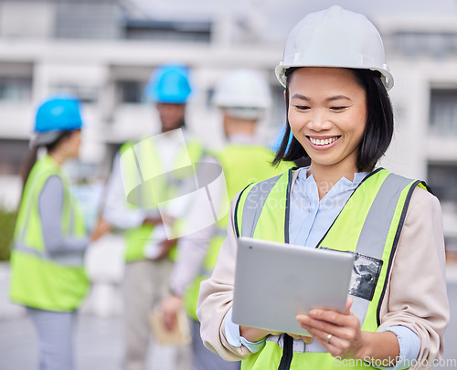 Image of Leadership, tablet or happy Asian woman contractor with smile for management or engineering success in construction site. Logistics, leader or warehouse manager in safety helmet or vision development