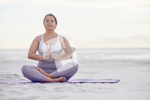 Image of Yoga meditation zen, beach and woman meditate for spiritual mental health, chakra energy balance or soul healing. Nature mockup, freedom peace and plus size girl with mindfulness, mindset or wellness