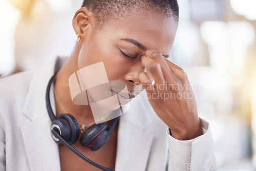 Image of Customer service consultant, headache and woman burnout from telemarketing on contact us CRM or African telecom. Tired call center face, ecommerce and information technology consulting on microphone