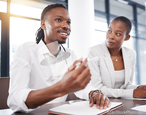 Image of Business, talking and black man in meeting with documents for marketing strategy, planning and ideas. Leadership, teamwork and workers in discussion for finance review, paperwork and project