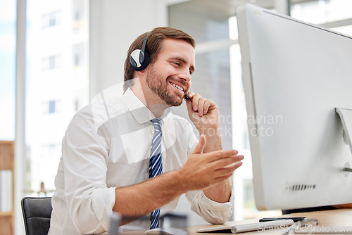 Image of Callcenter, customer service or man on computer for virtual support, consulting or networking in office. Manager, CRM or sales advisor on tech for telemarketing, research or telecom contact us help