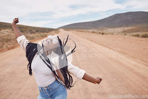 Image of Freedom, excitement and mockup with a black woman dancing in the desert for fun during a road trip. Travel, dance and mock up with a person enjoying a holiday or vacation in nature to celebrate life