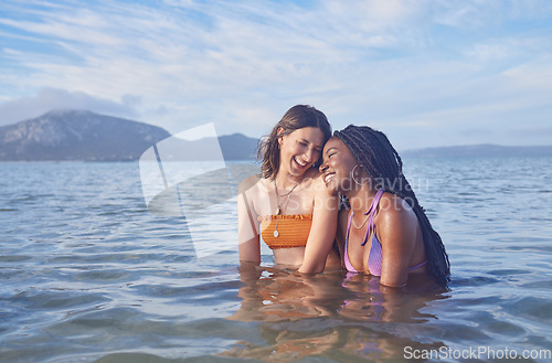 Image of Travel, ocean and happy with friends swimming at beach for relax, summer break and vacation with blue sky mockup. Smile, bonding and diversity with women for peace, nature and tropical holiday