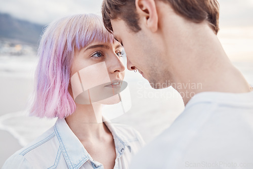 Image of Intimacy, beach and couple with a love moment while on summer date for valentines day or anniversary. Romance, sea and young gen z man and woman with intimate embracing by ocean together in Australia