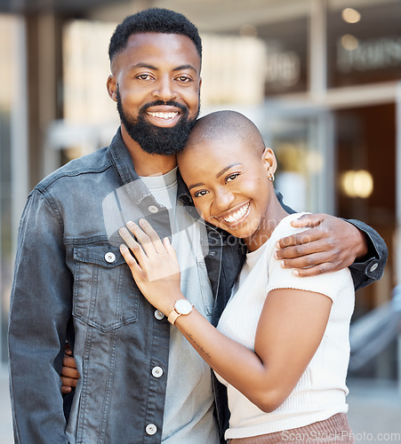 Image of Black couple, portrait and hug in city for love, care and happiness on date together in Nigeria. Happy man, woman and partner in urban street, road and outdoor for trust, support and relax with smile