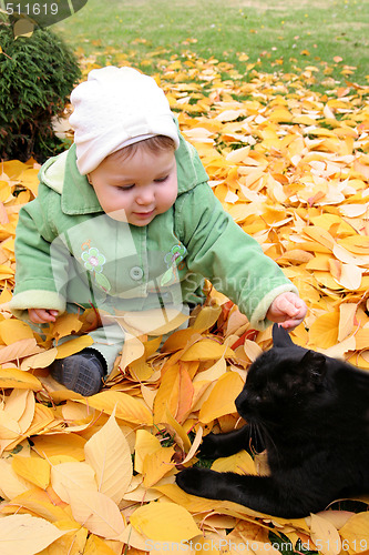 Image of baby and cat 