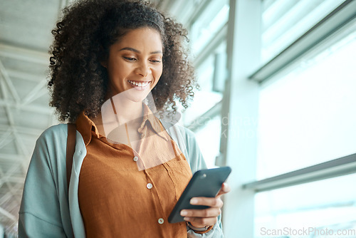 Image of Black woman at airport, travel with phone and communication and check social media with smile on face. Notification, email or chat with technology, ready for flight and happy for adventure