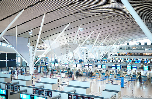 Image of Airport, travel and arrival or departure in a terminal with a boarding gate for global or international traveling. Building, interior and architecture in an empty terminus for business or tourism